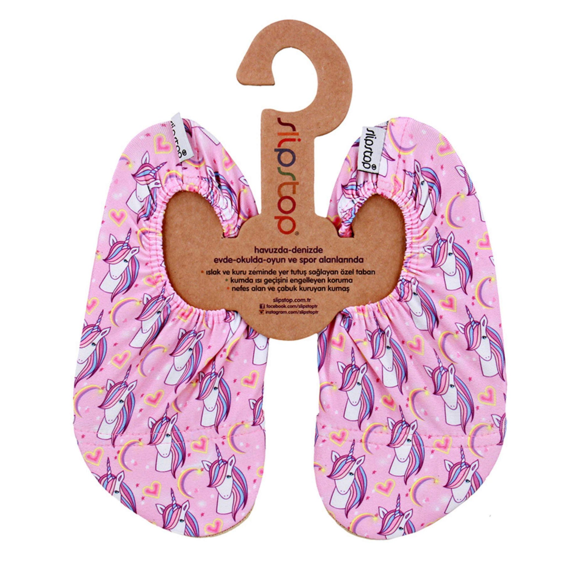 Vaaleanpunaiset Slipstop-tossut pienillä yksisarvisenkuvilla, sopivat rannalle, uima-altaaseen ja sisäkäyttöön